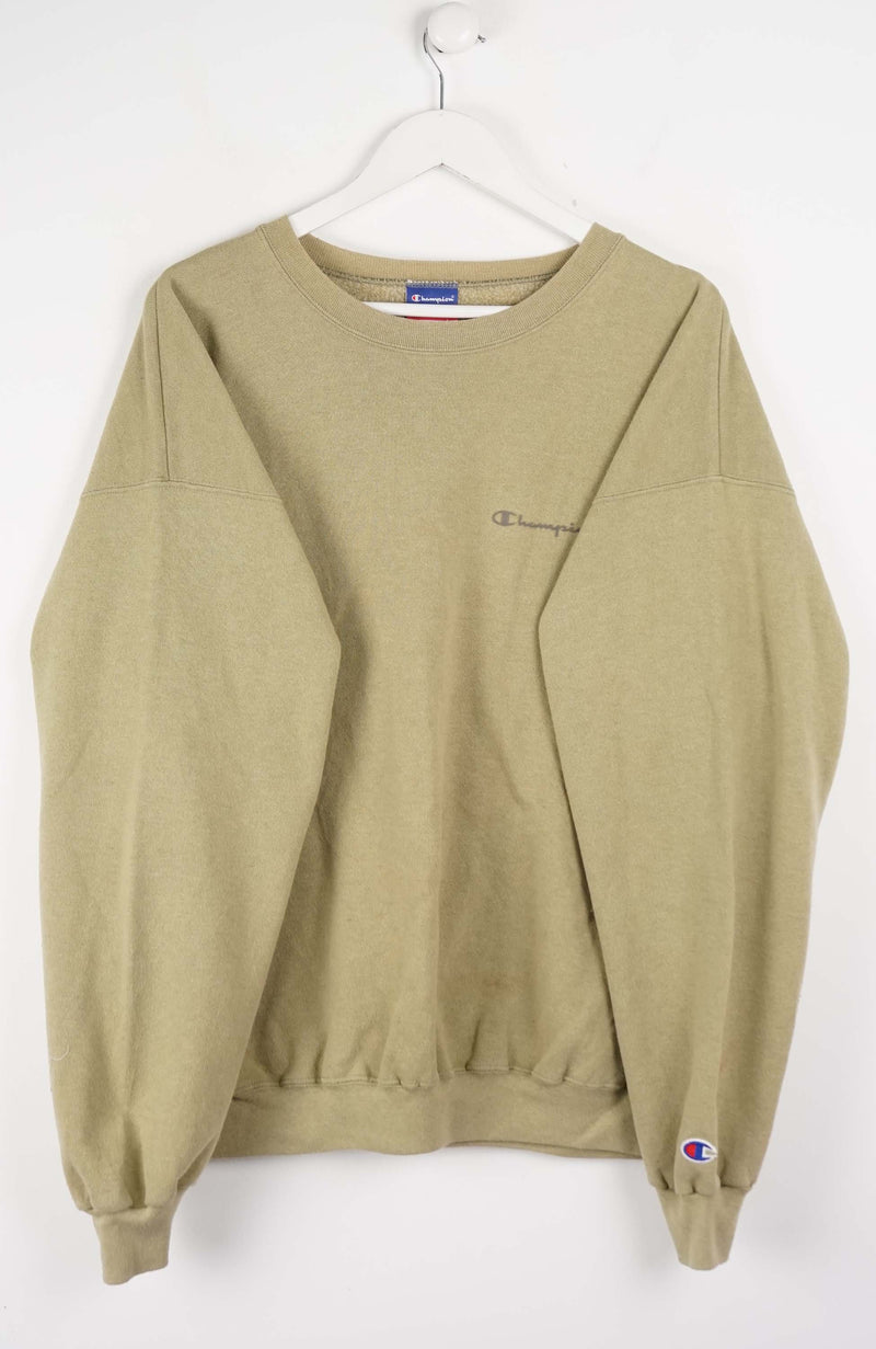 Beige sweatshirt with Champion logo on a white background