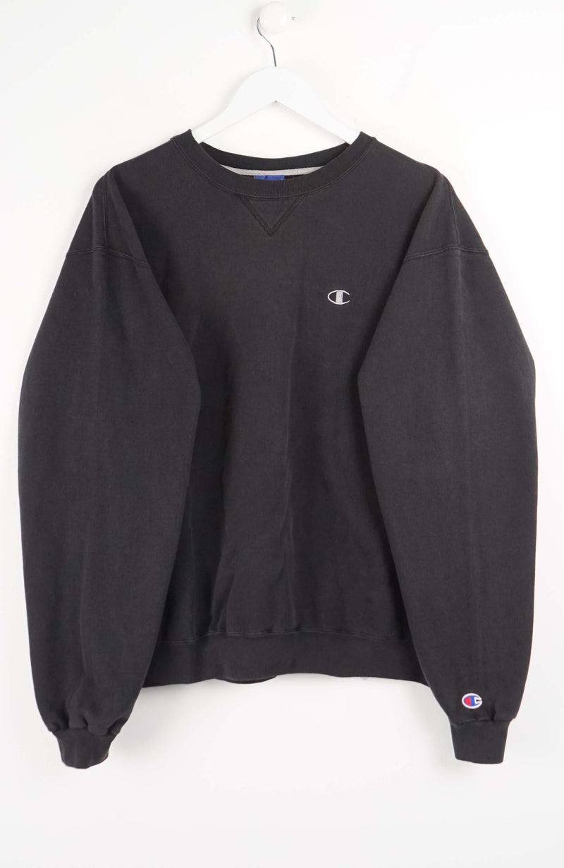 Black sweatshirt with Champion logo on a white background
