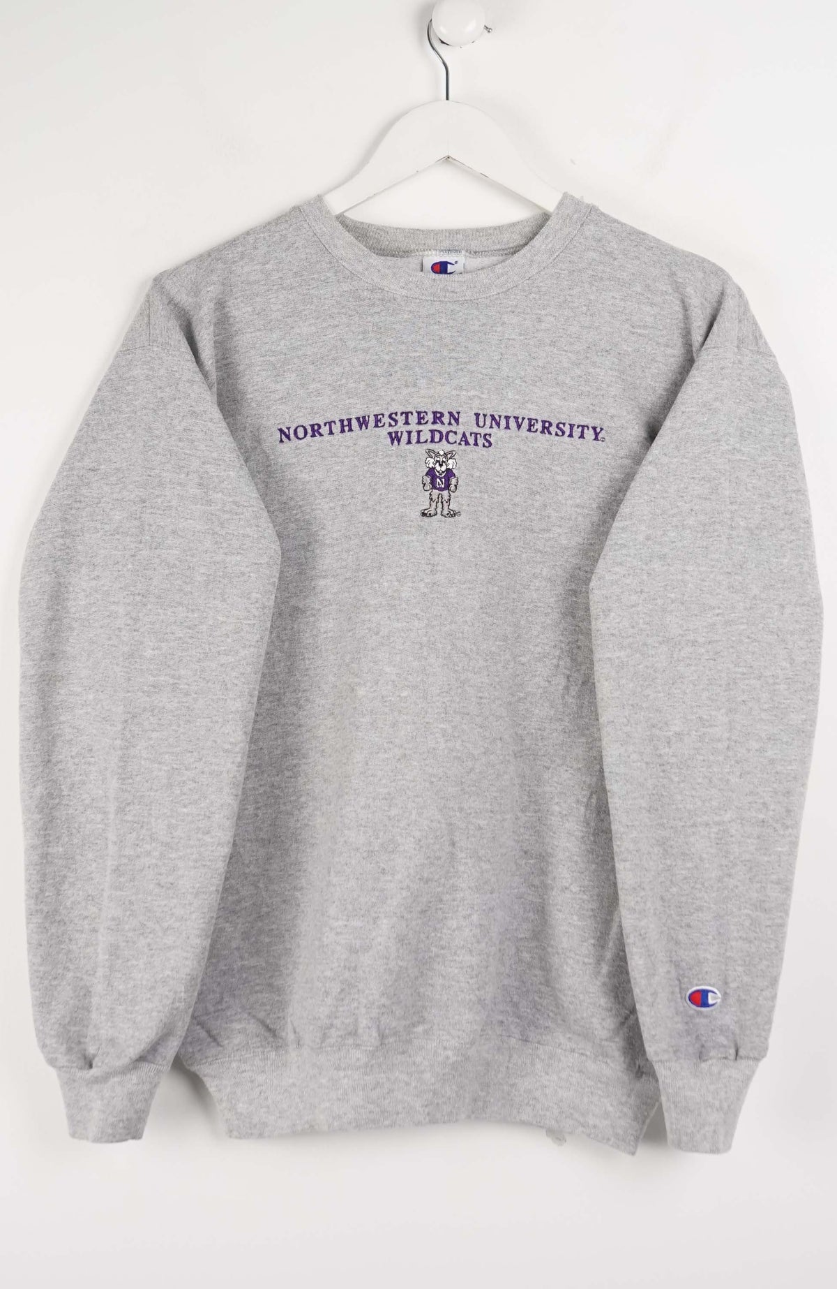 Gray sweatshirt with Northwestern University logo on a white background
