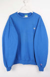 Blue sweatshirt with Champion logo on a white background