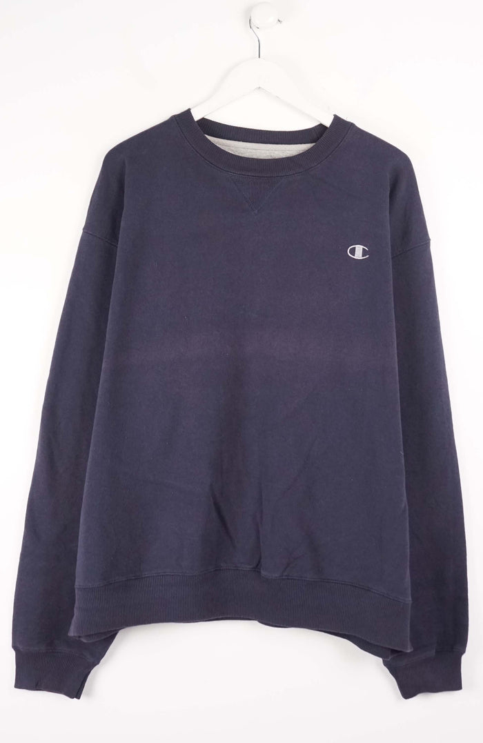 Navy blue sweatshirt with Champion logo on a white background
