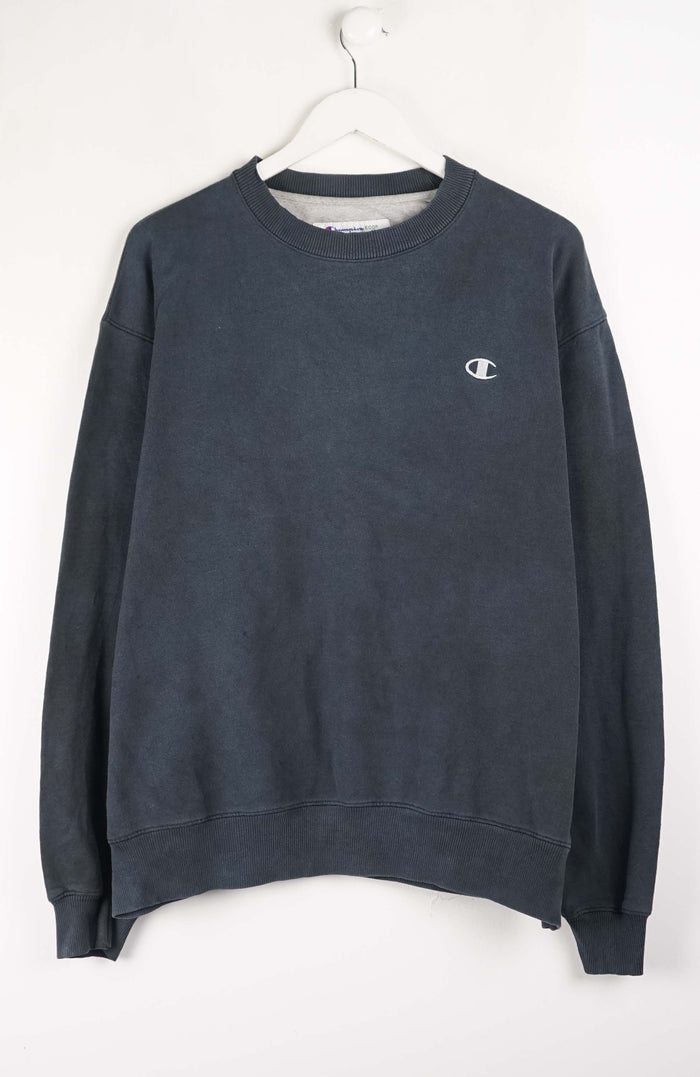 Navy blue sweatshirt with a small logo on a white background