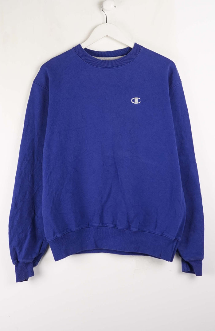 Blue sweatshirt with a logo on a white hanger against a white background