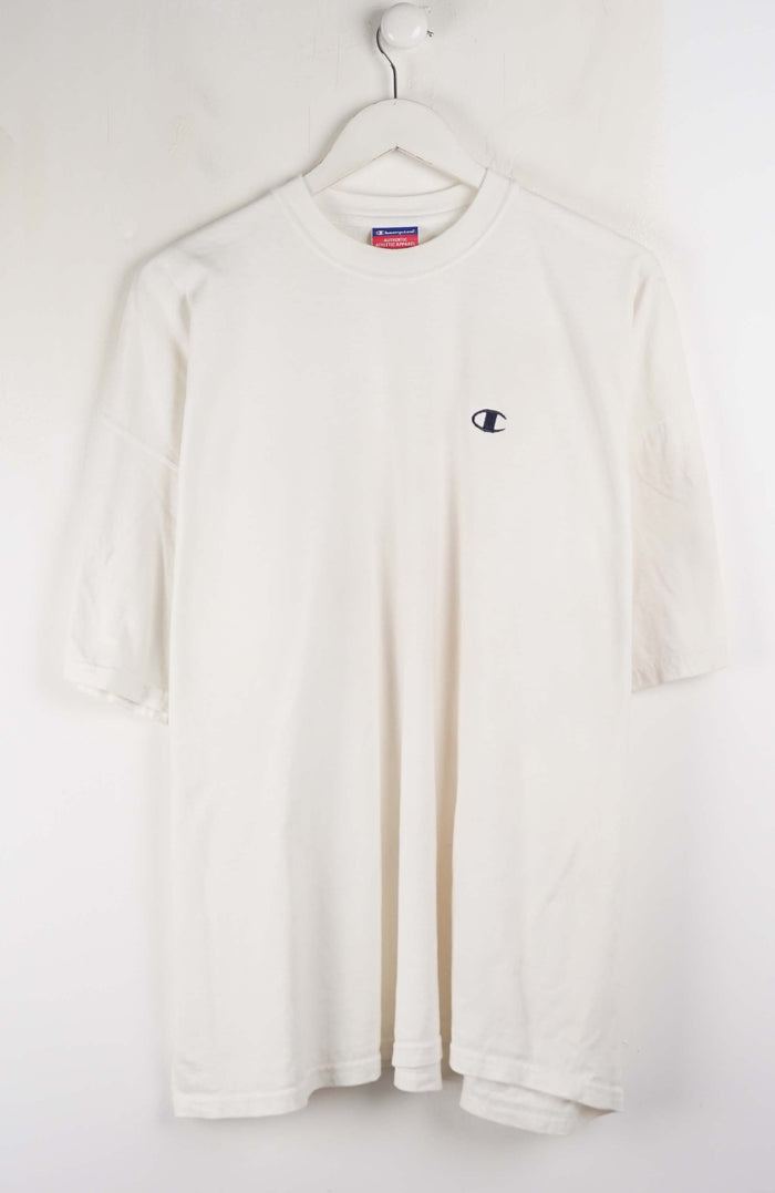 White long-sleeve shirt with a small logo on a hanger against a white background