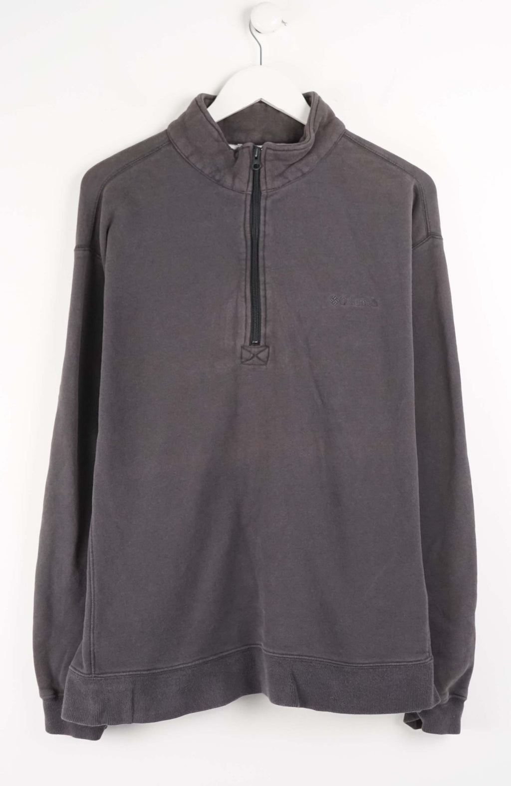 Gray pullover with a quarter zip on a white hanger against a white background