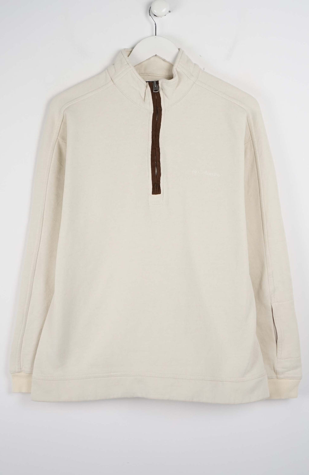 Beige fleece pullover with a quarter zip on a white background