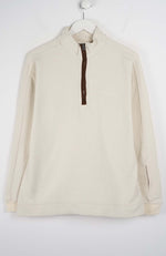 Beige fleece pullover with a quarter zip on a white background