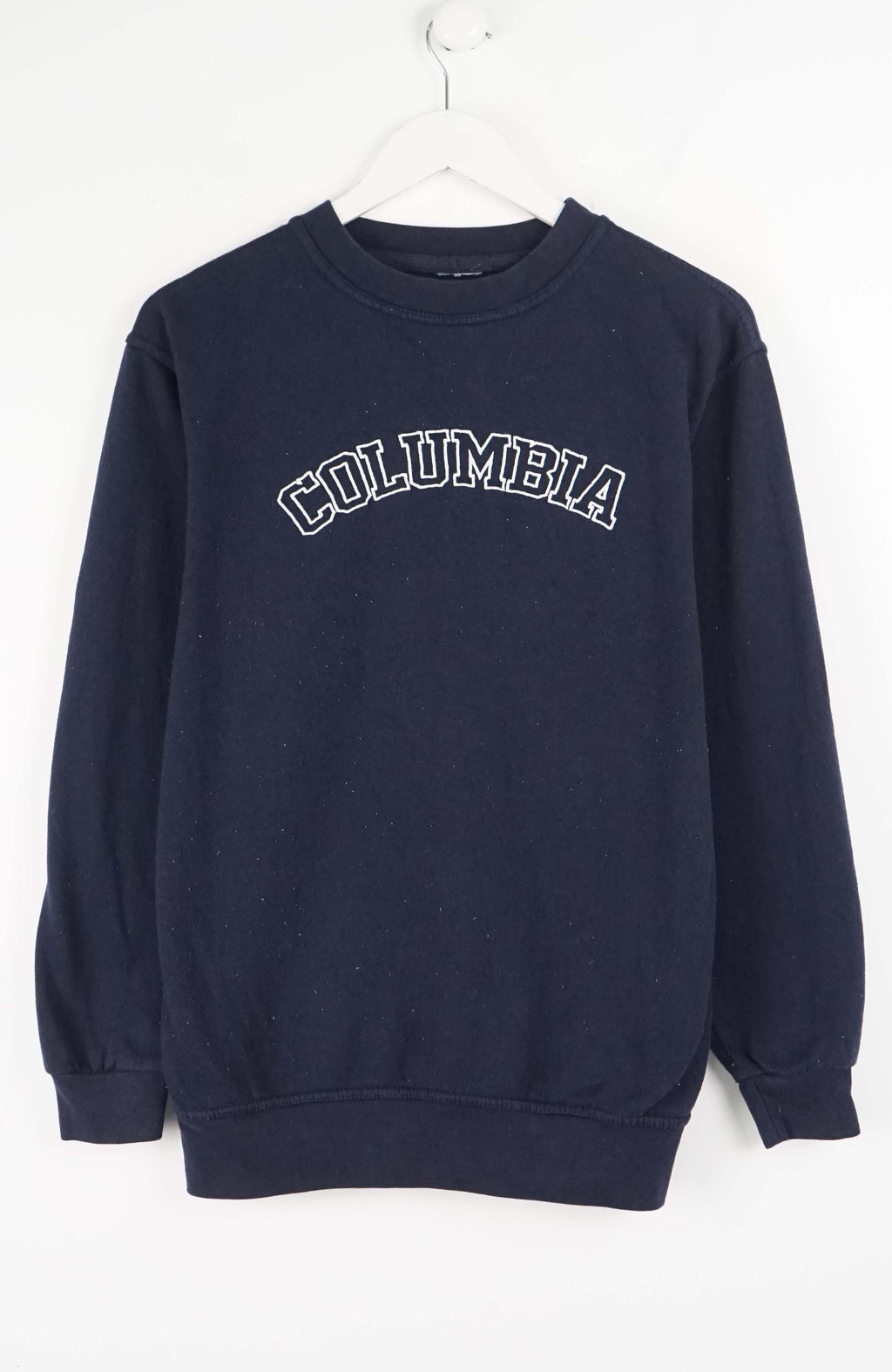 Navy blue Columbia sweatshirt on a white hanger against a white background