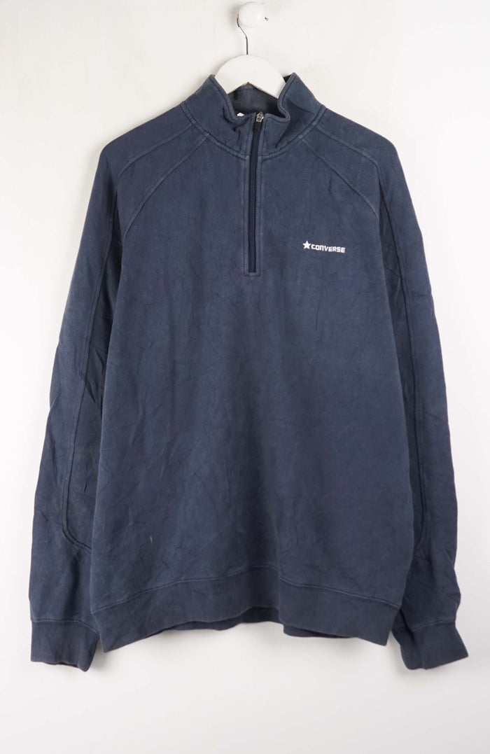 Navy blue pullover with a brand logo on a white background