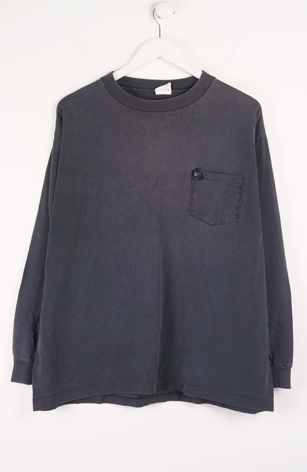 Gray long-sleeve shirt with a pocket on a white background