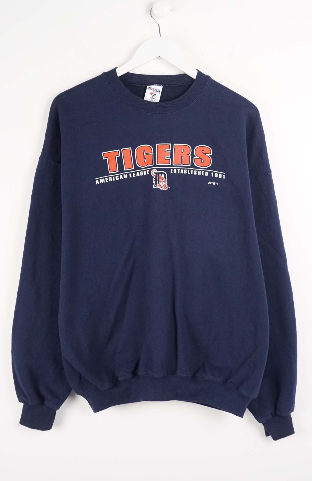 Navy blue sweatshirt with 'Tigers' text on a white background