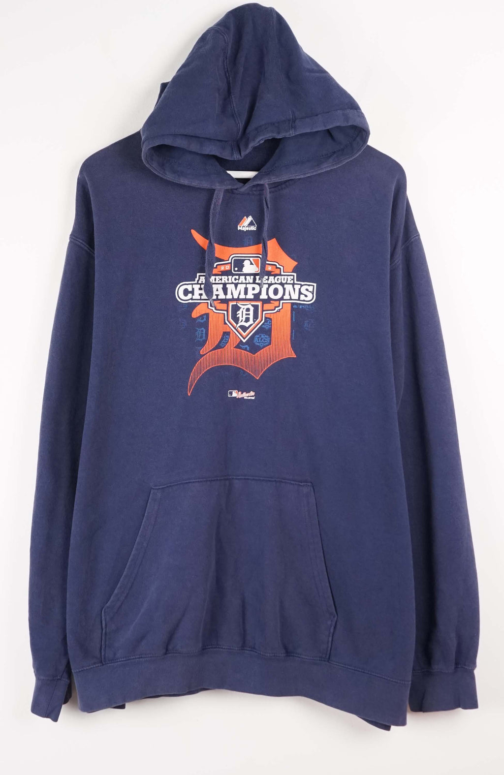 Navy blue hoodie with sports team logo on a white background
