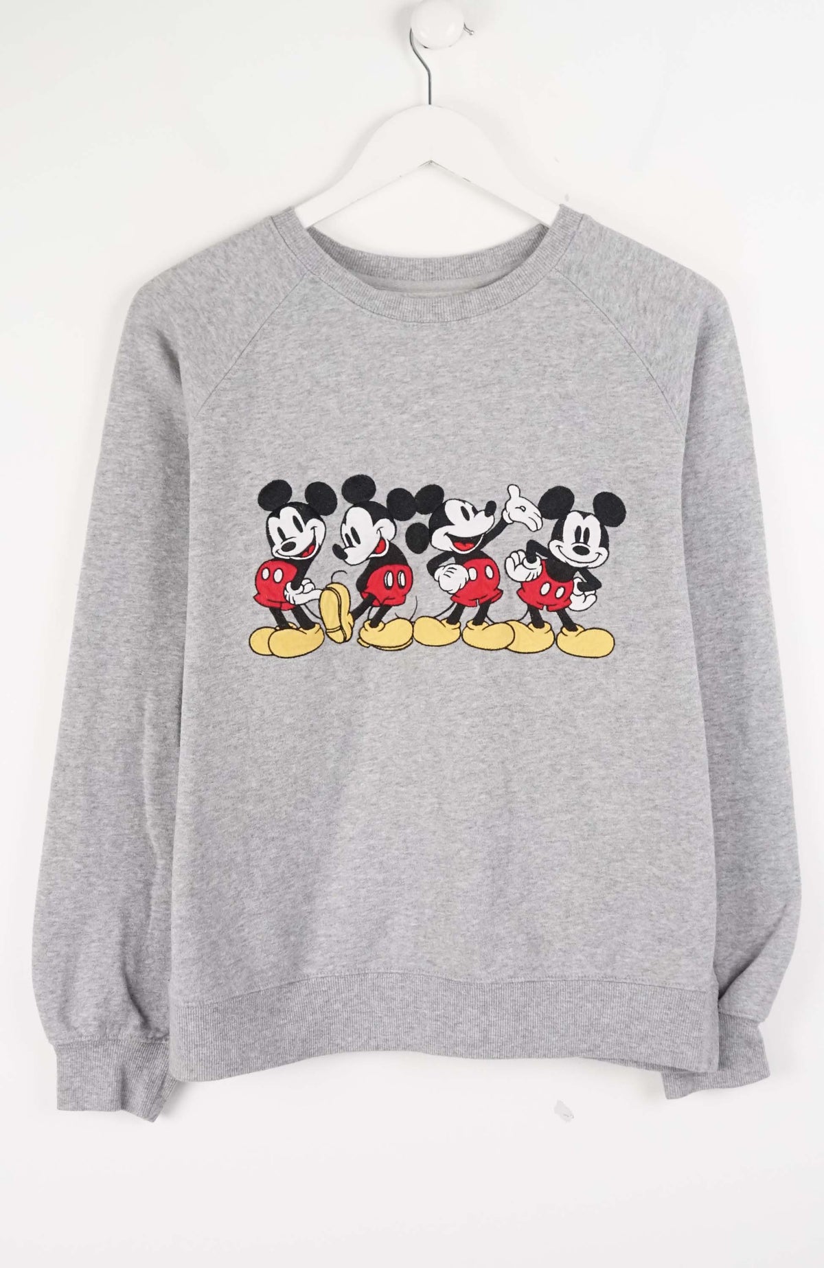 Gray sweatshirt with cartoon character design on a white background