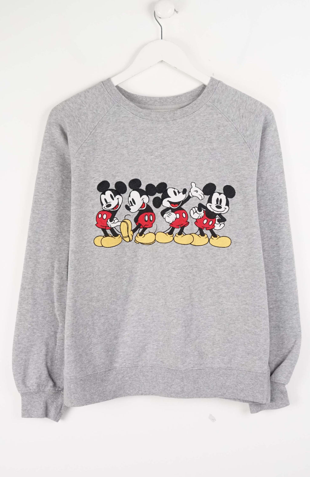Gray sweatshirt with cartoon character design on a white background