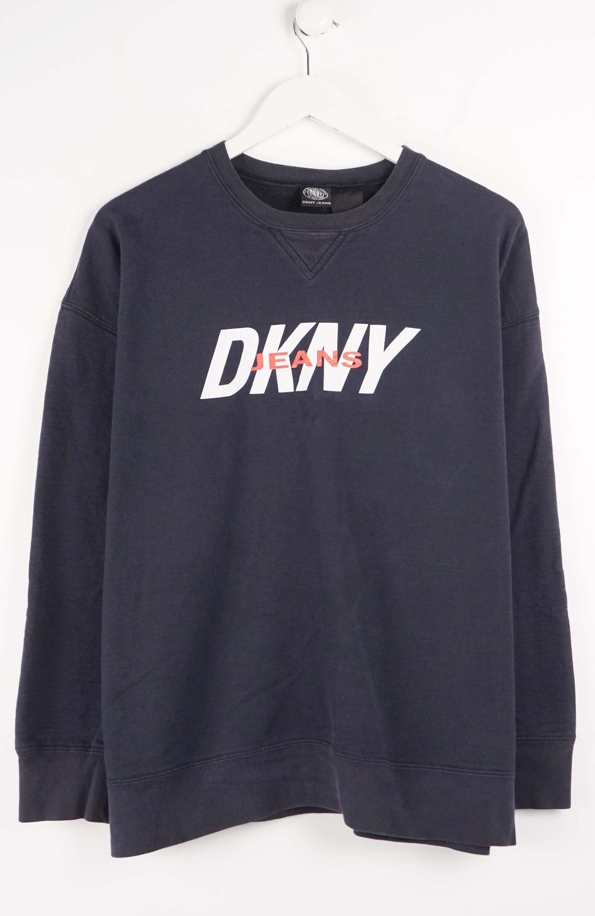 Navy blue sweatshirt with 'DKNY' logo on a white background