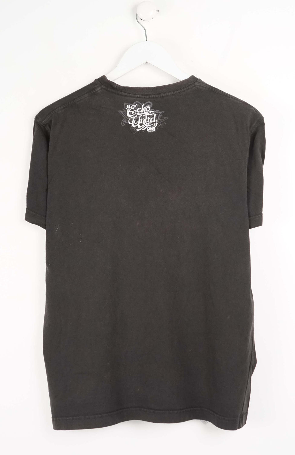 Black t-shirt with a graphic design of a woman and mandala on a white background