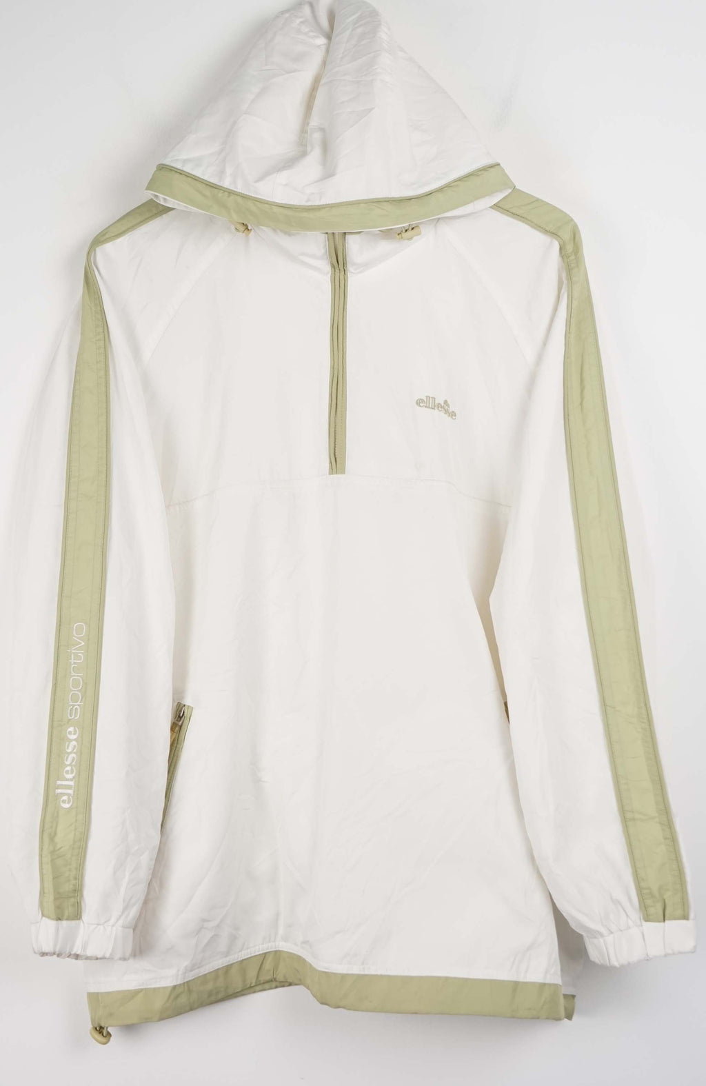 White jacket with green accents on a white background