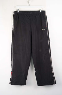 Black pants with white stripes on a white background