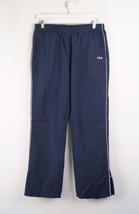 Navy blue pants with a brand logo on a white background