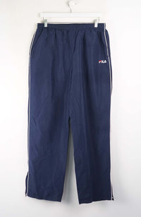 Navy blue pants with a white brand logo on a white background
