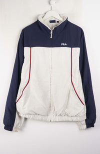 Navy and white jacket with red accents on a hanger against a white background