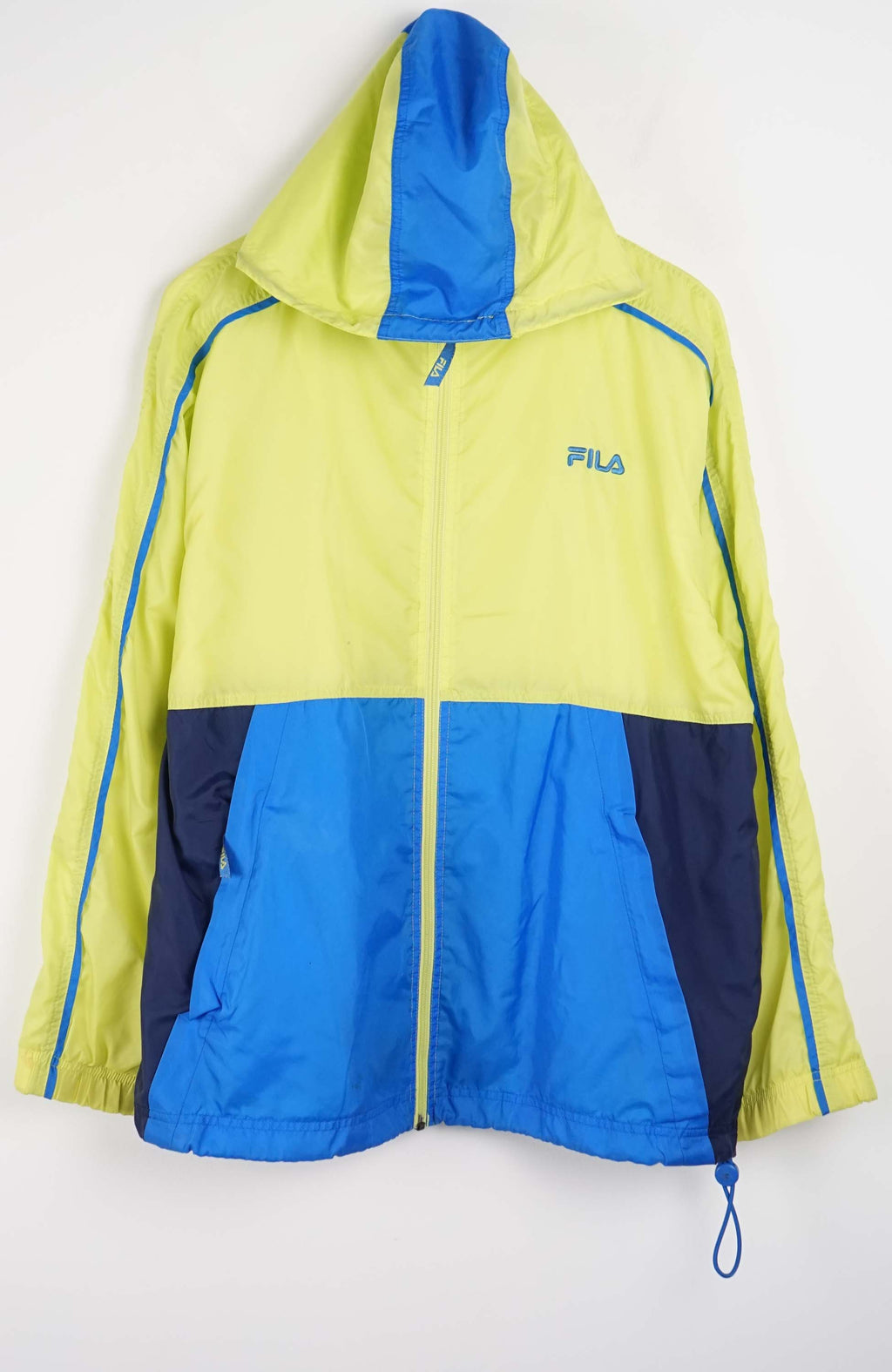Yellow and blue jacket with FILA logo on a white background