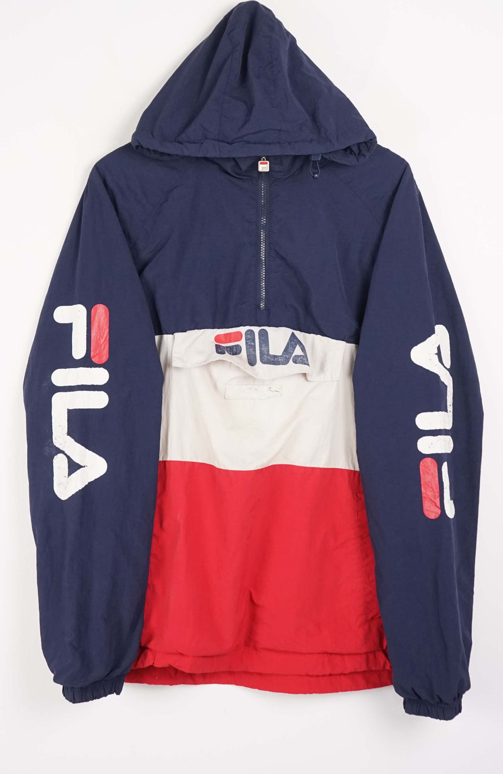 Navy, red, and white jacket with FILA logo on a white background