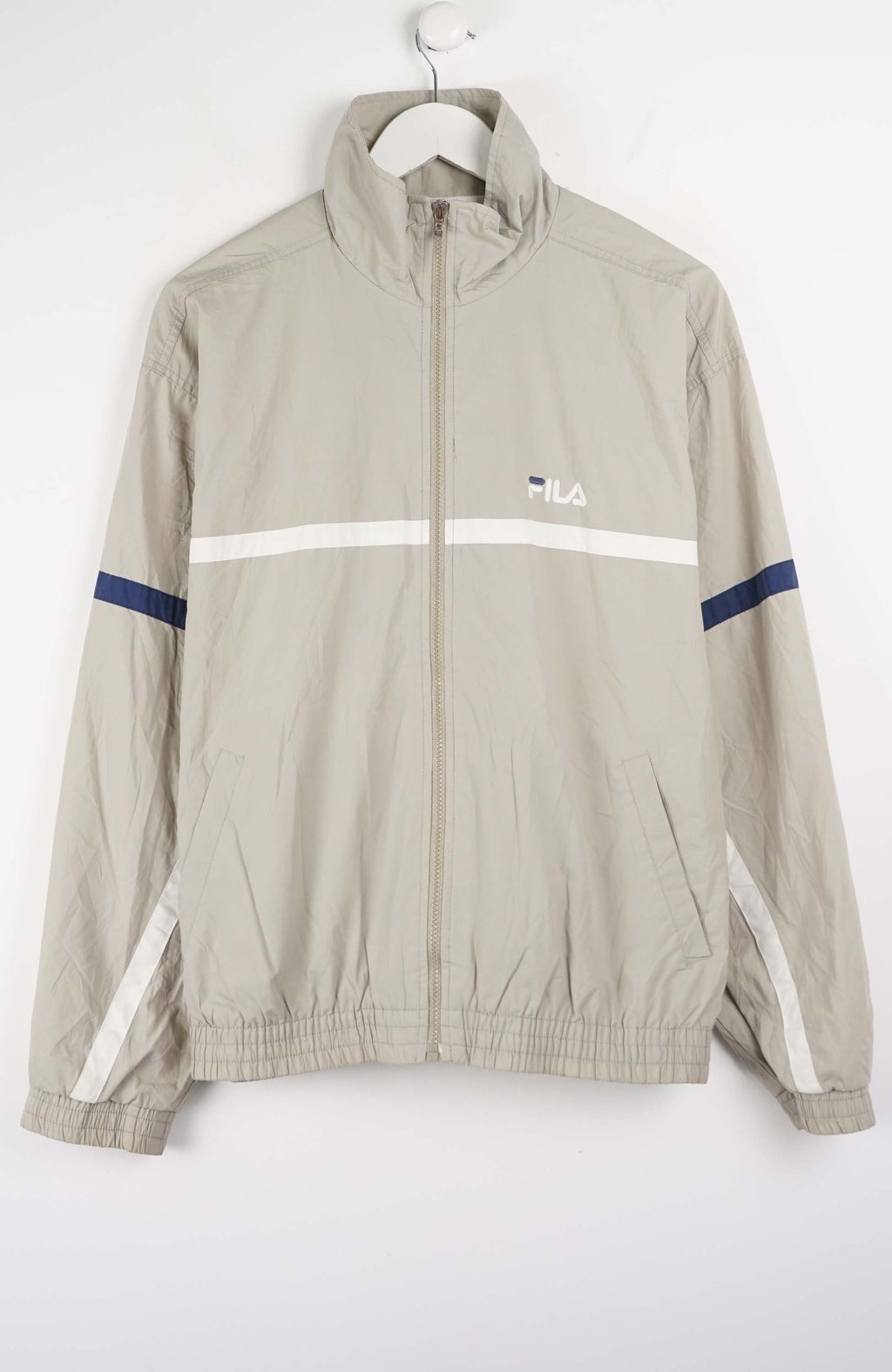 Beige jacket with white and blue accents on a white background