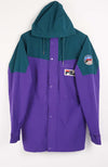 Two-tone teal and purple jacket with a brand logo on a white background