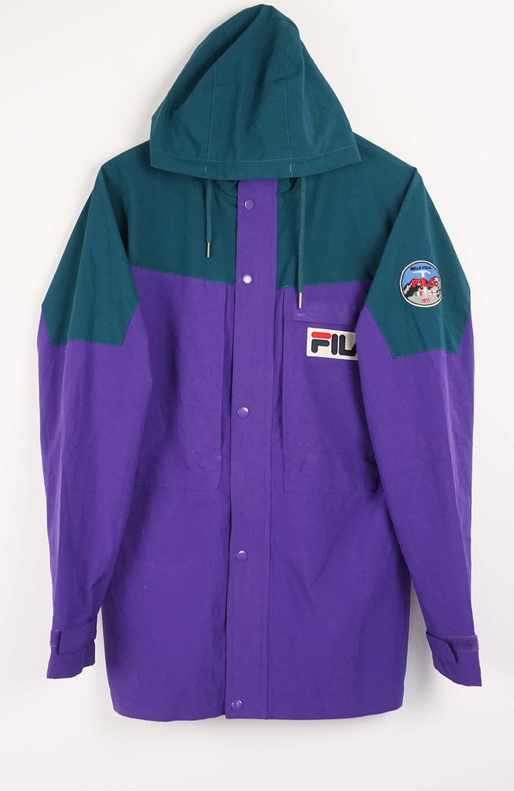Two-tone teal and purple jacket with a brand logo on a white background
