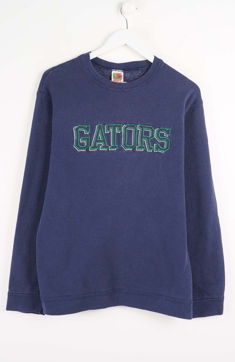 Navy blue sweatshirt with 'GATORS' text on a white background
