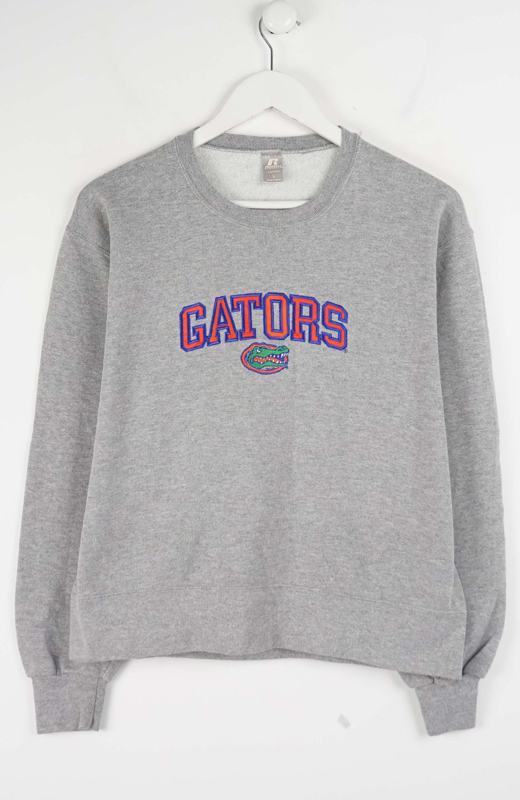 Gray sweatshirt with 'Gators' text and logo on a white background