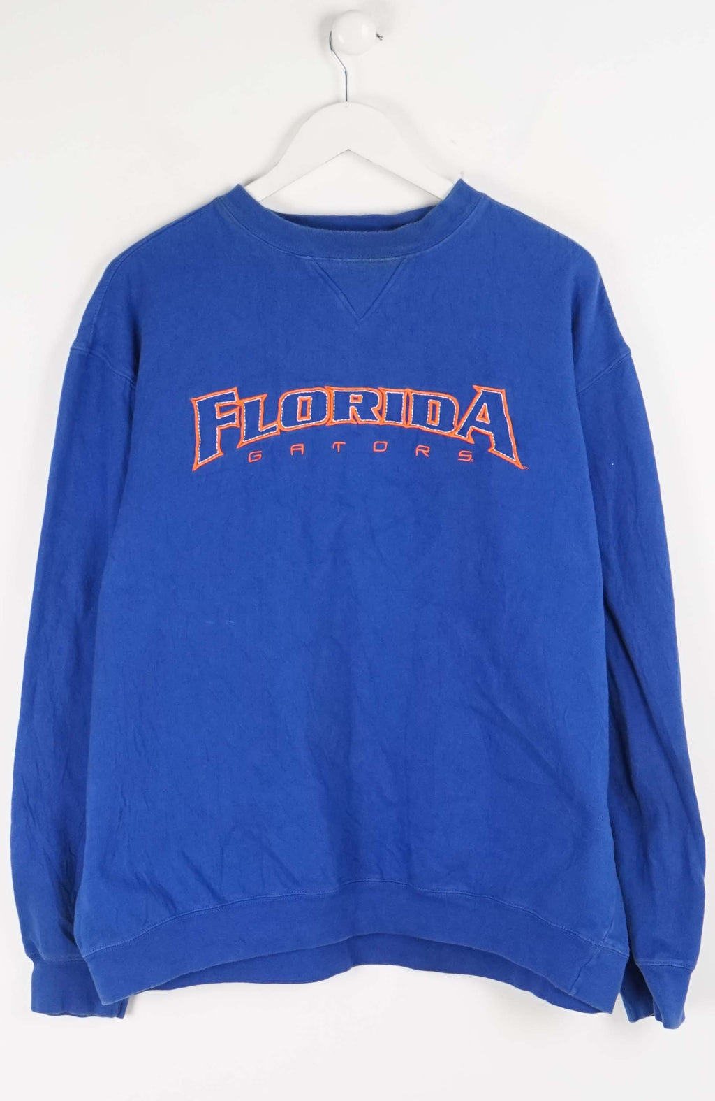 Blue sweatshirt with 'Florida Gators' text on a white background