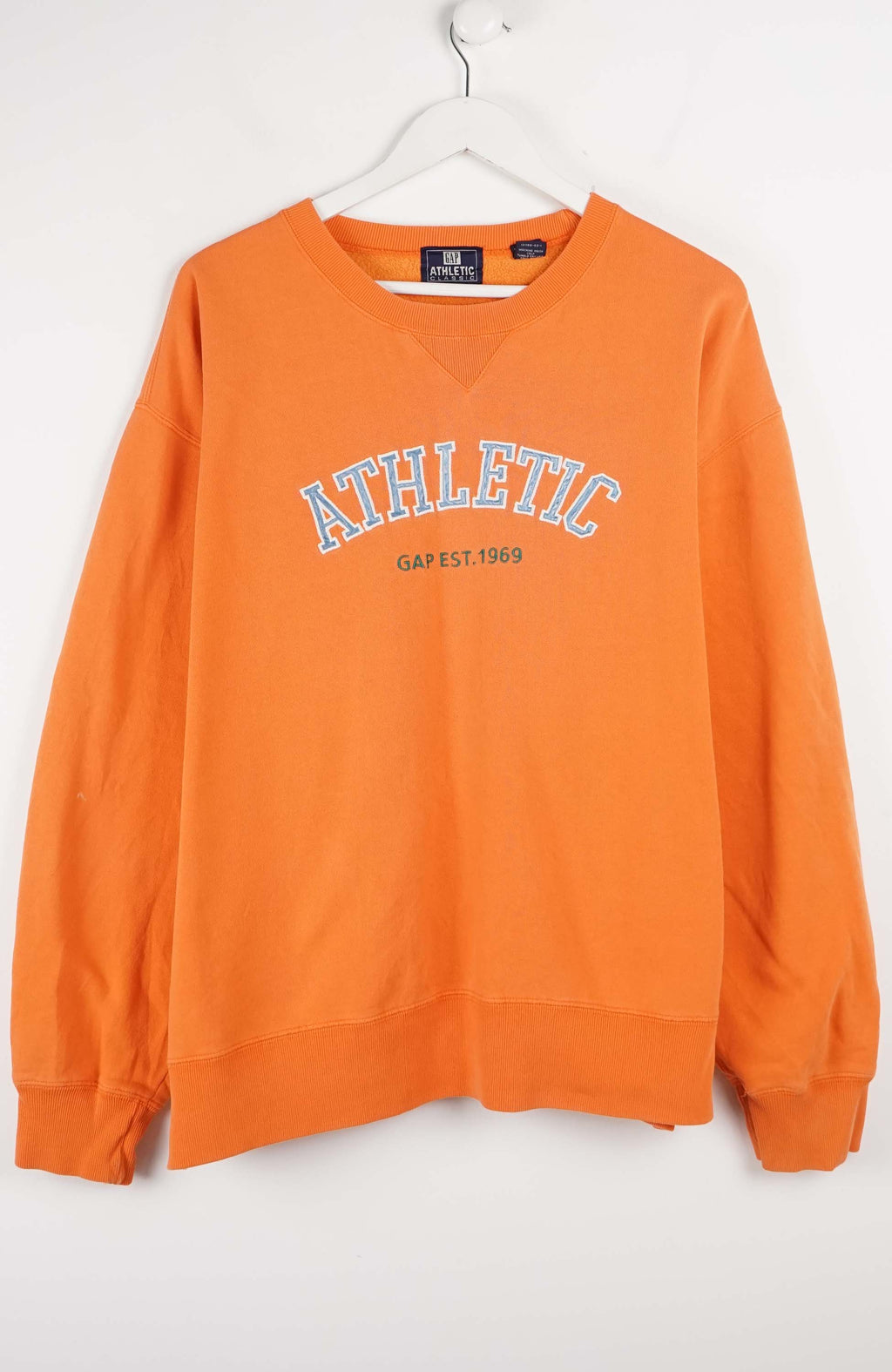 Orange sweatshirt with 'Athletic' text on a white background