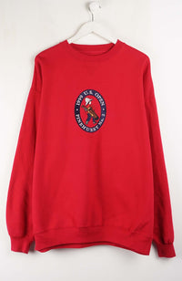 Red sweatshirt with a logo on a white background