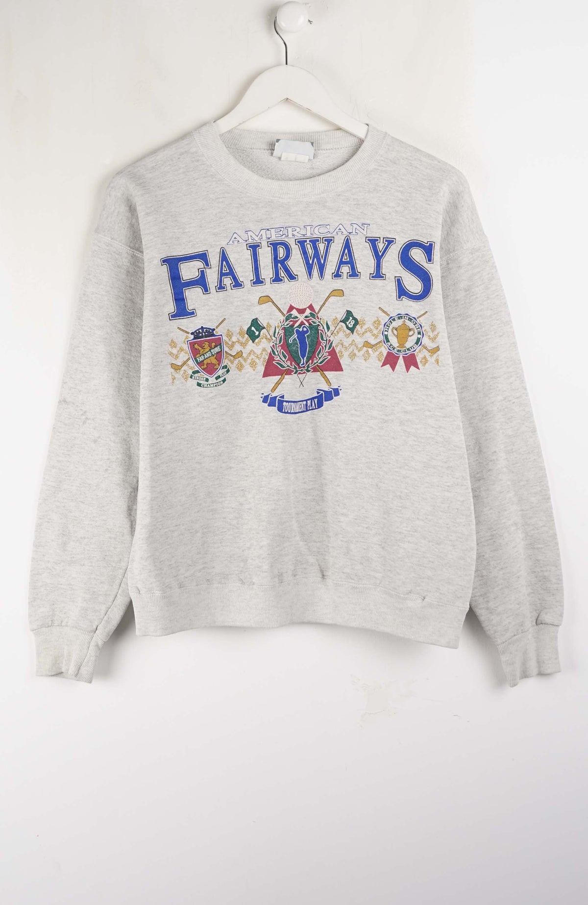 Gray sweatshirt with 'FAIRWAYS' text and graphics on a white background