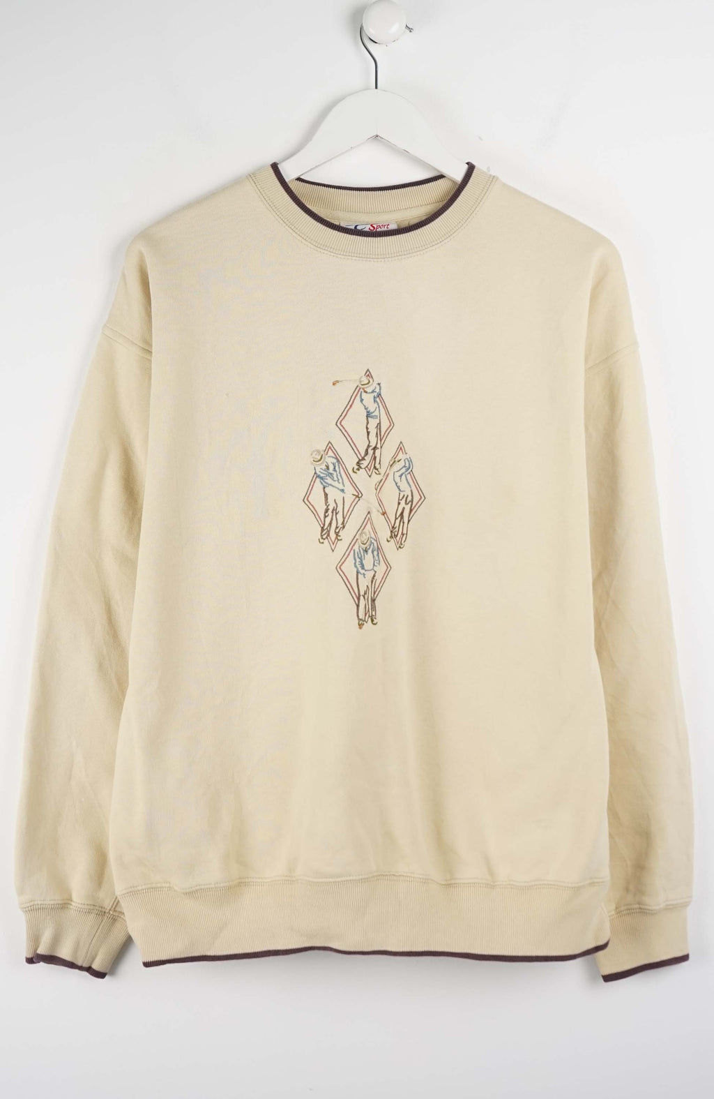 Beige sweatshirt with a decorative pattern on a white background