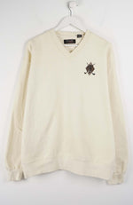 Beige sweater with a logo on a white background
