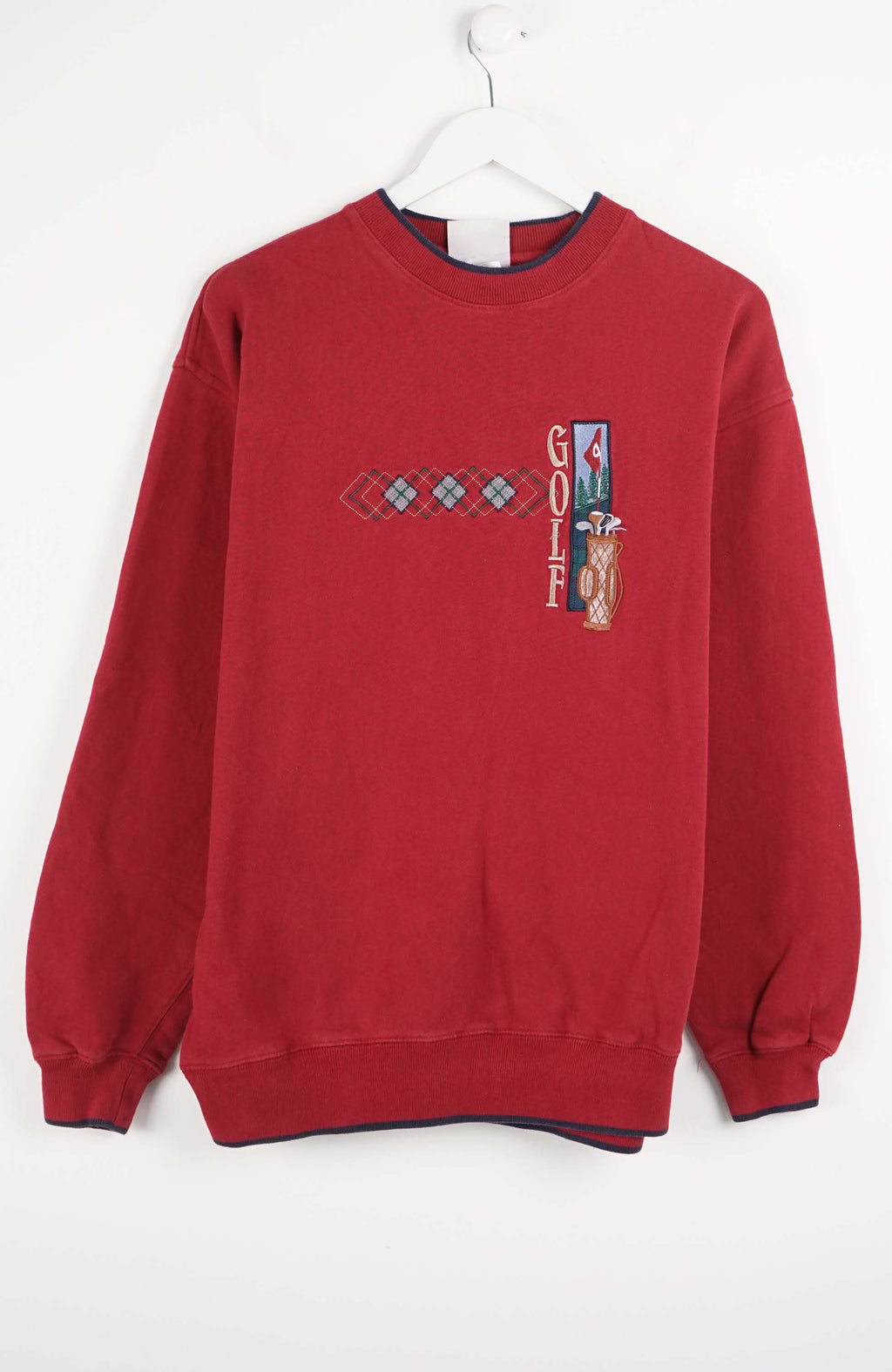 Red sweatshirt with a graphic design on a white background