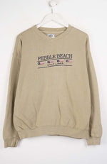 Beige sweatshirt with 'Pebble Beach Golf Links' text on a white background