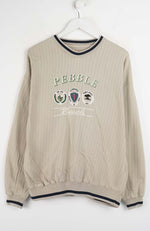 Beige ribbed sweater with 'Pebble' branding on a white background
