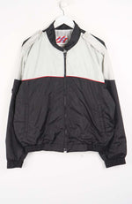 Two-tone jacket with black and gray design on a white background