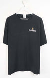Black t-shirt with Guinness logo on a white background