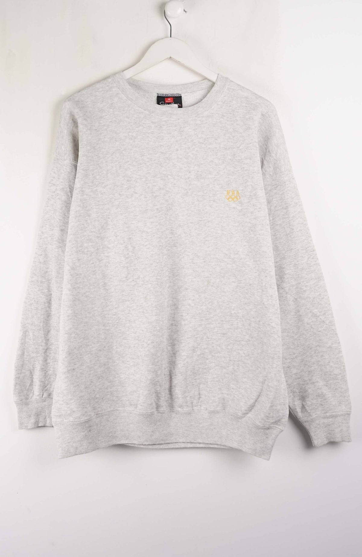 Gray sweatshirt with brand logos on a white background