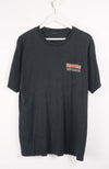 Black t-shirt with text on a white background