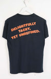 Black t-shirt with orange text on a white background