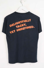 Black t-shirt with orange text on a white background