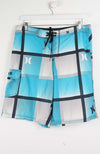 Blue and white checkered shorts with a brand logo on a white background