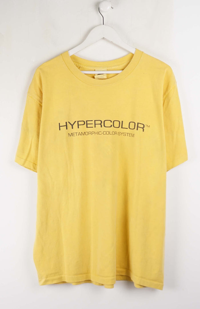 Yellow t-shirt with 'HYPERCOLOR' text on a white background