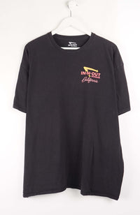 Black t-shirt with 'In-N-Out' logo on a white background